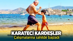 Foçalı karateci kardeşler çalışmalara sahilde başladı
