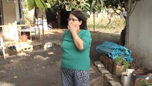 Evinde çamaşır makinesinden çıkan yangını gözleri dolarak izledi