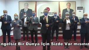 MHP Isparta teşkilatından işaret diliyle "Engelsiz dünya için sen de bir adım at" mesajı
