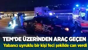 TEM'de üzerinden araç geçen yabancı uyruklu kişi feci şekilde can verdi
